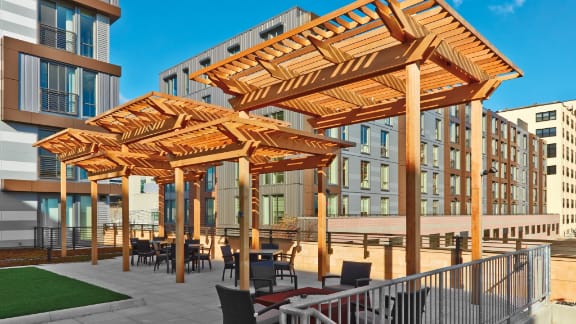 Restaurant patio pergola defining an outdoor dining area