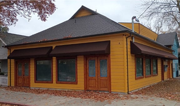 Building with new awning covers installed