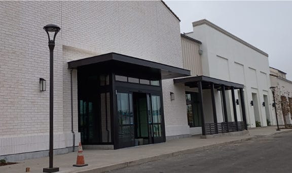 Building with new metal awning covers installed