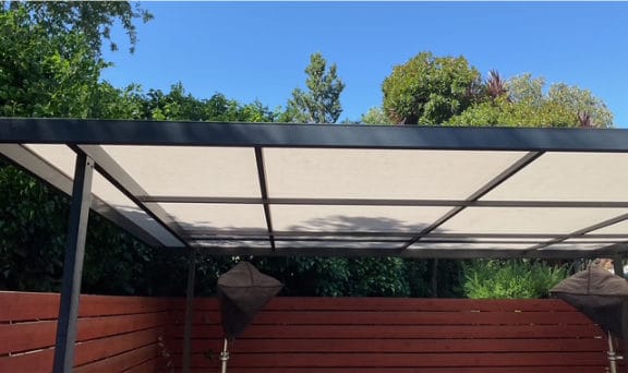 Building with new metal awning covers installed