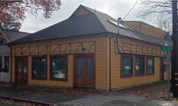 Building that has the structure for awning covers but is missing the actual awning covers