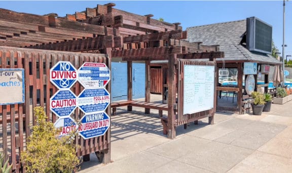 Old pergola used for shade poolside