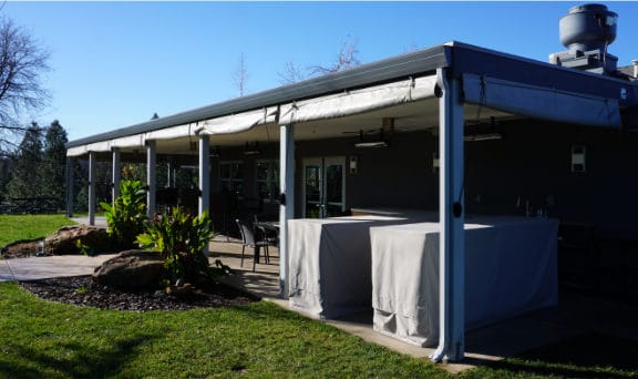 Patio with old pull down shades still installed