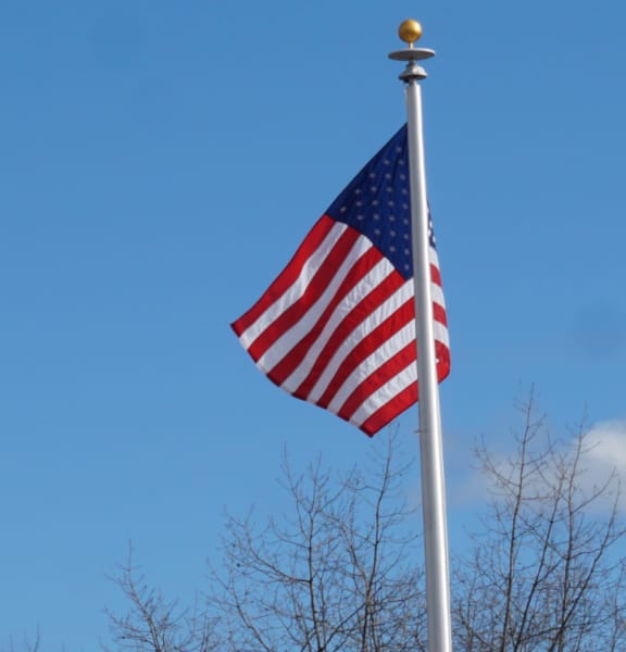 Flagpole with an american flag on it